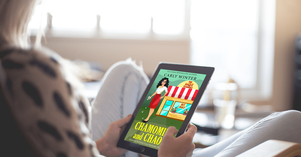 woman reading chamomile and chaos on an ereader by carly winter
