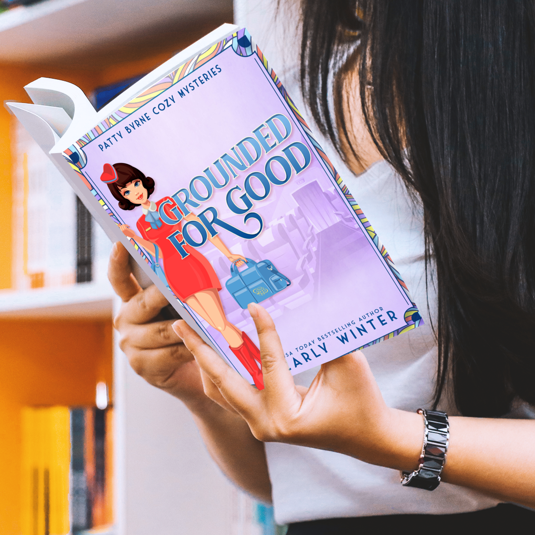 woman reading grounded for good historical cozy mystery paperback by carly winter
